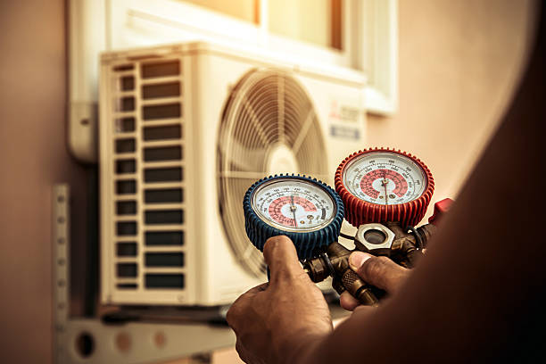 Professional Hvac technician working in Bellville, TX